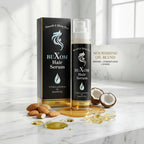 Buxom hair serum bottle and packaging on a marble surface with coconuts and almonds.